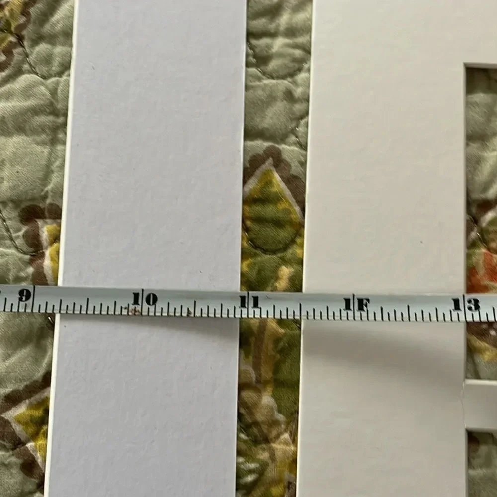 5 new/unused white picture frame mats. Sizes shown in pics.